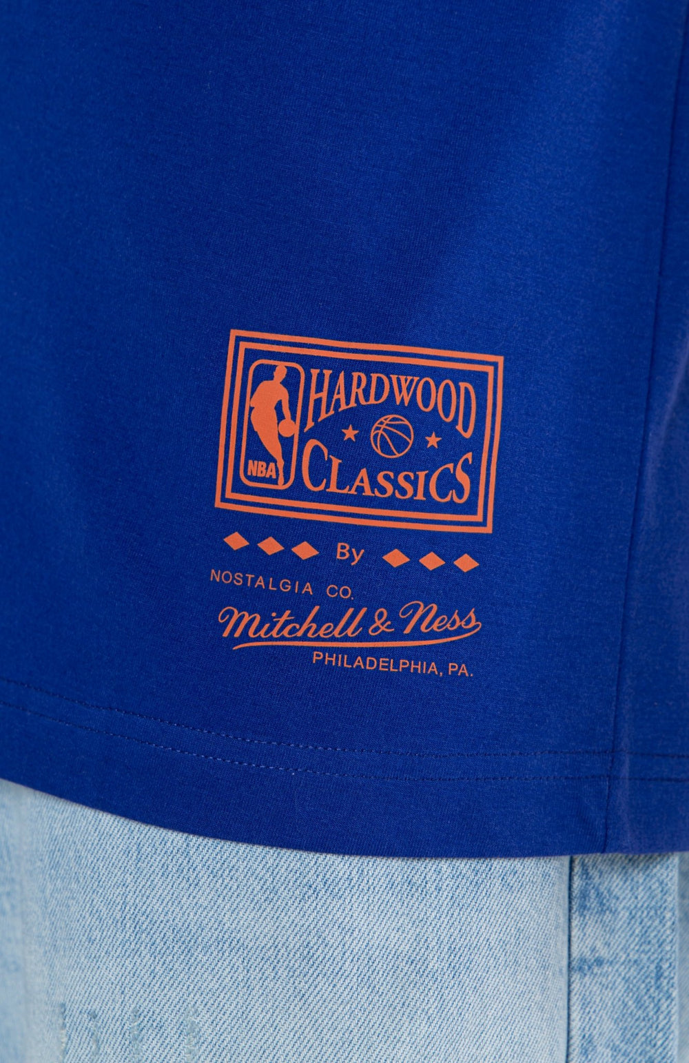 Mitchell and Ness Polera Graphic Logo Hombre New York Knicks - NBA Store Chile